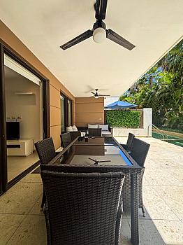 Renta exclusivo departamento en Playa del Carmen con alberca privada y club de playa en Lorena Ochoa