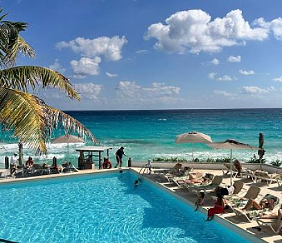 Venta exclusivo departamento frente al mar caribe en Cancún con amenidades de Resort