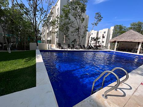 Renta Departamento en Residencial la Selva con alberca, cancha de pádel  y seguridad