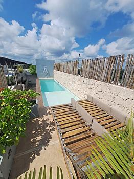 Oportunidad departamento moderno en Tulum con rooftop y alberca