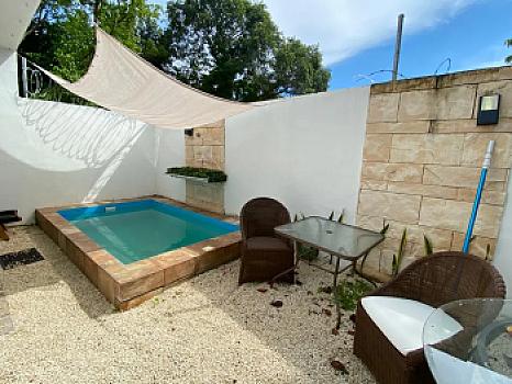 Casa en venta en Residencial Aldea Ha Puerto Morelos con alberca privada y roof garden