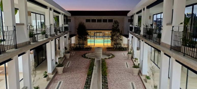 ¡Lo mejor de dos mundos! Casa de 1 nivel con Roof Garden en Preventa