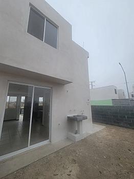2-story house 2 bedrooms 1 1.5 bathrooms corner lot with extra land