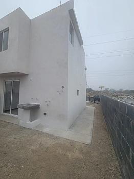 2-story house 2 bedrooms 1 1.5 bathrooms corner lot with extra land