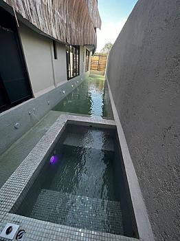 Venta estudio totalmente amueblado y equipado con Alberca y jacuzzi a 5 min de la playa y Av Kukulcan